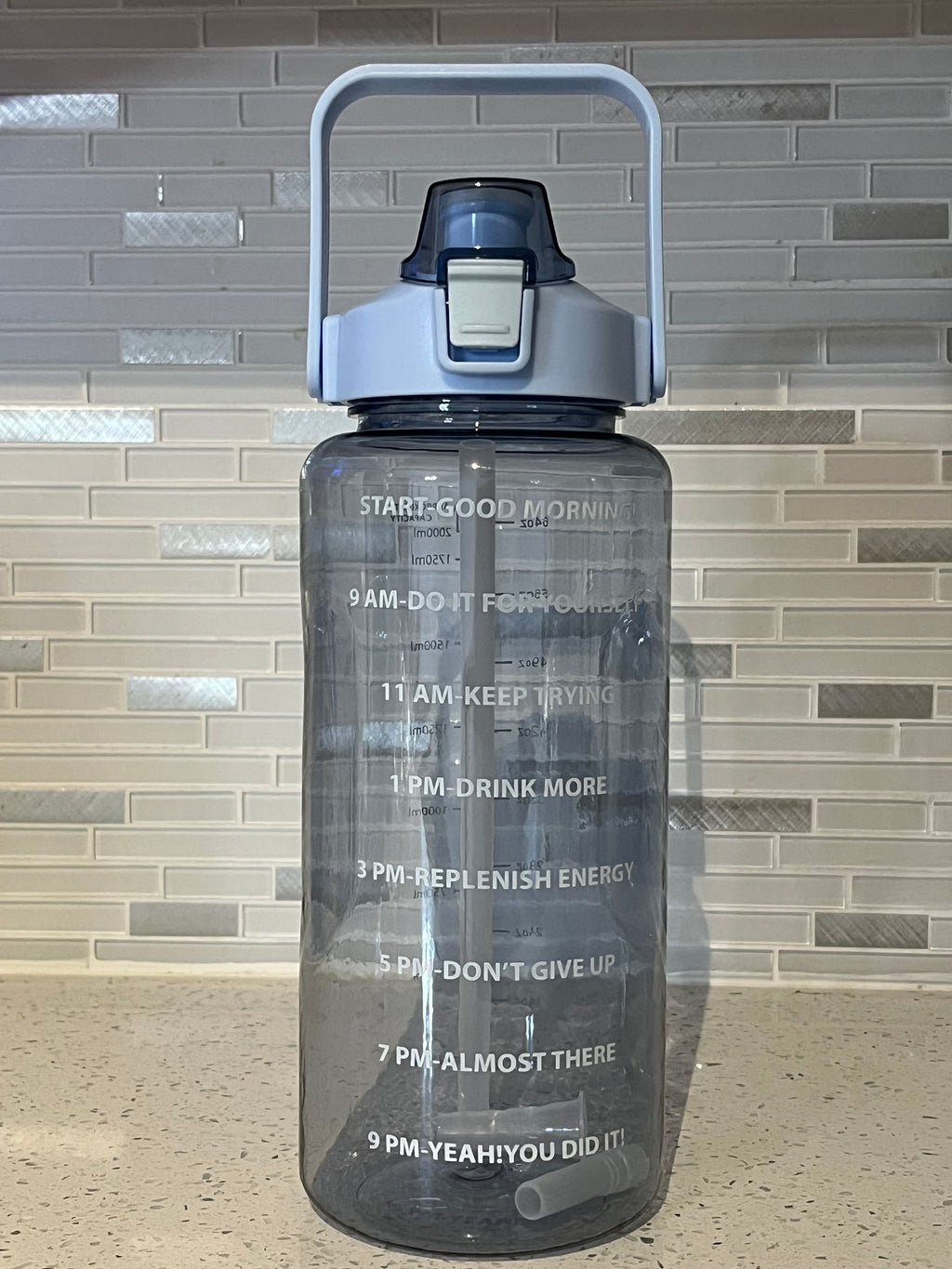 blue 64 oz. sports water bottle
