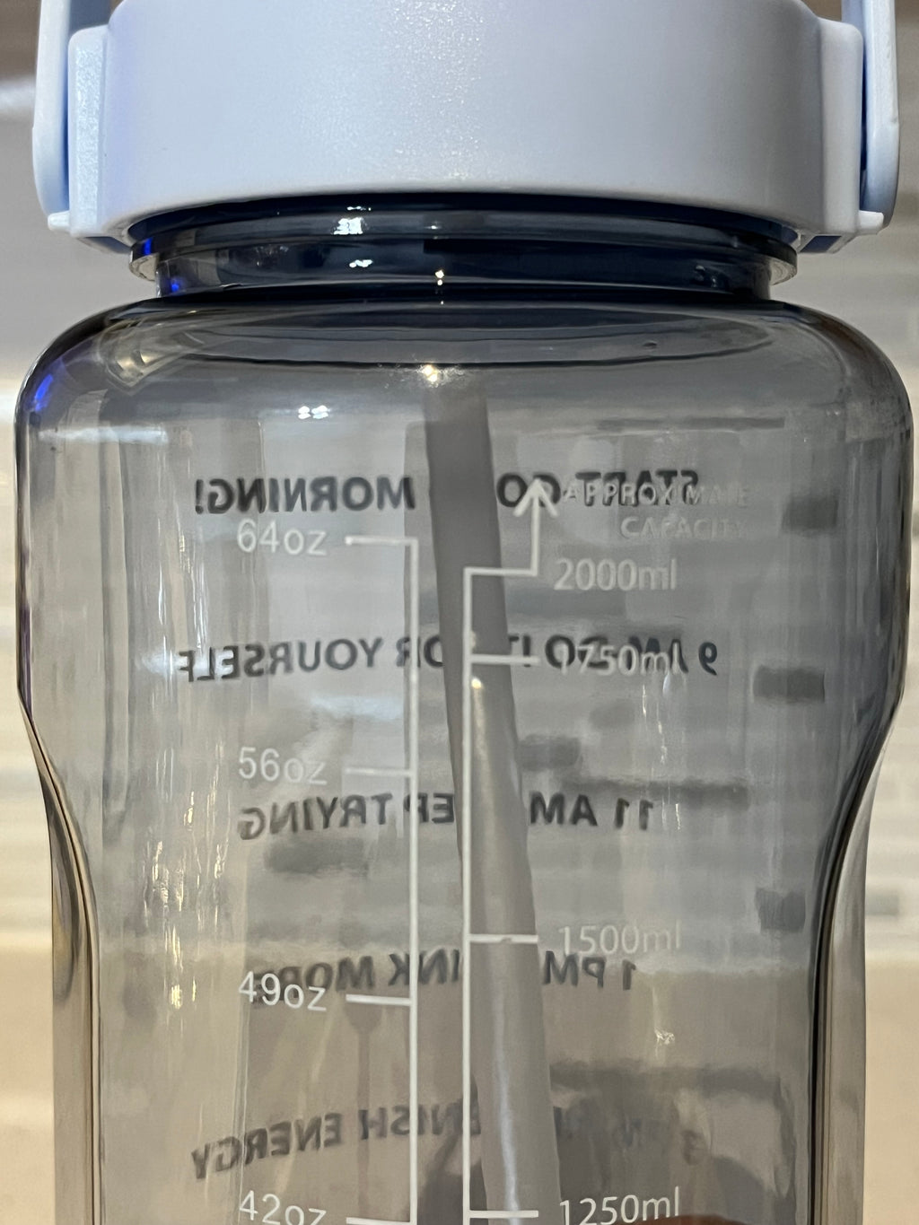 blue 64 oz. sports water bottle